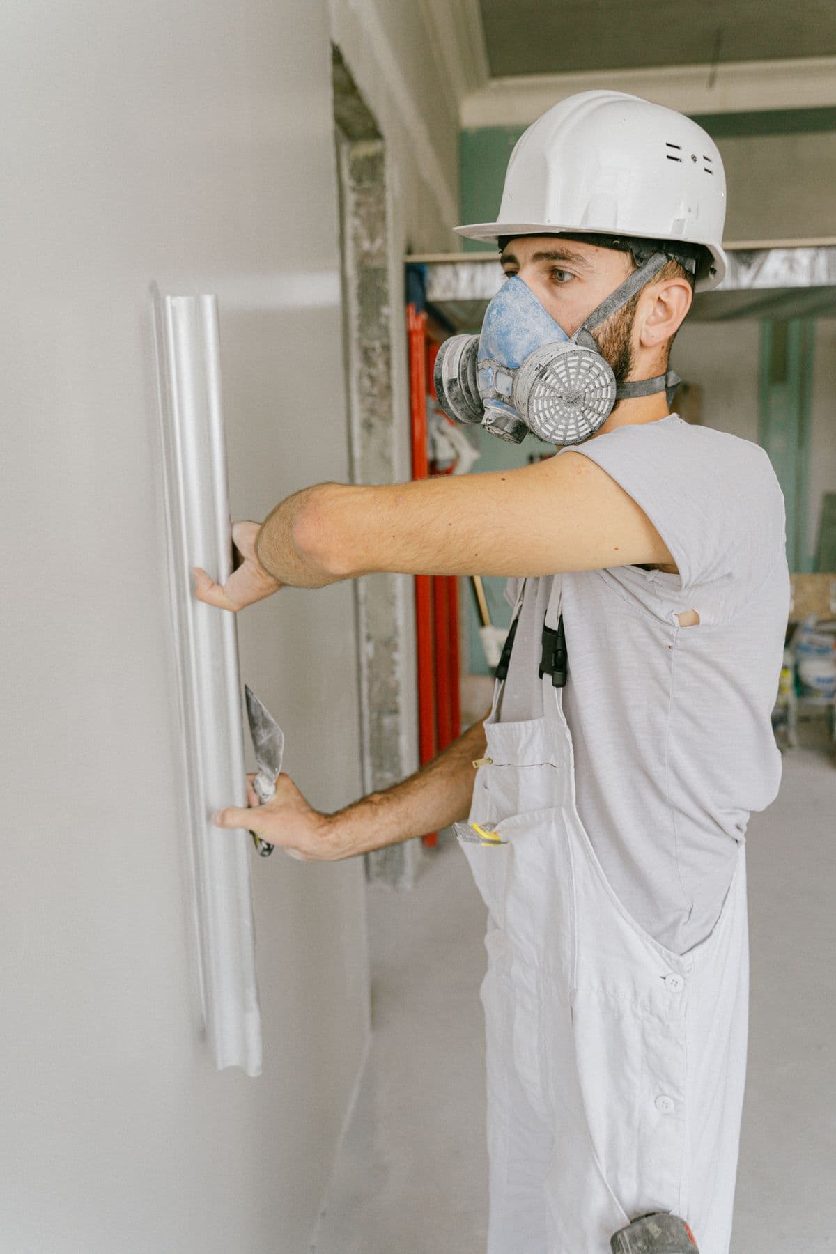 JCT Drywall owner Jonathan finishing drywall in Pinellas County